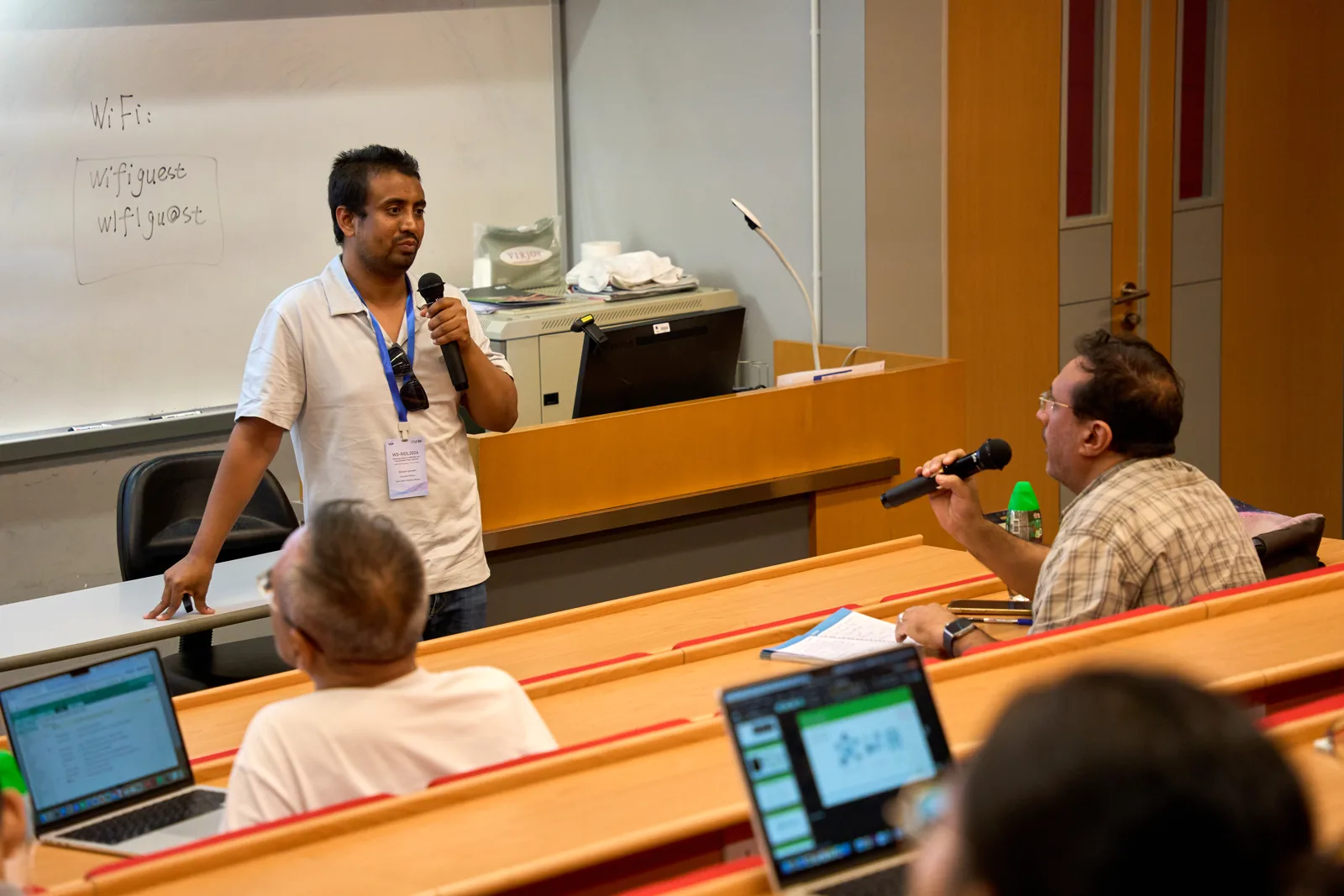 A tutorial speaker engaging with the audience
