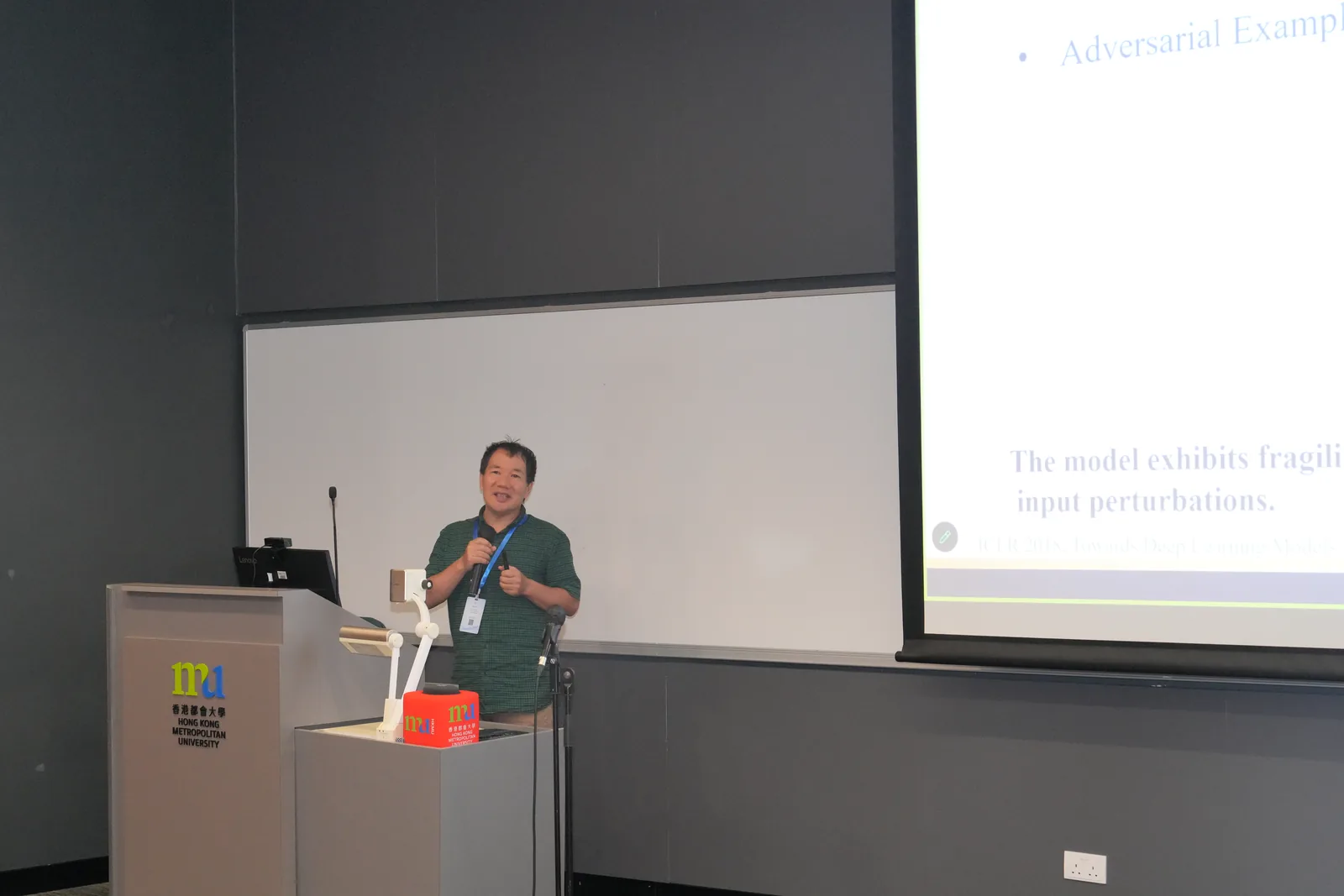 A speaker addressing participants at WS-RIDL 2026